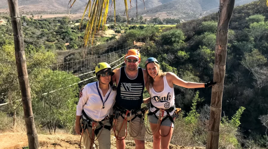 happy people with climbing gear