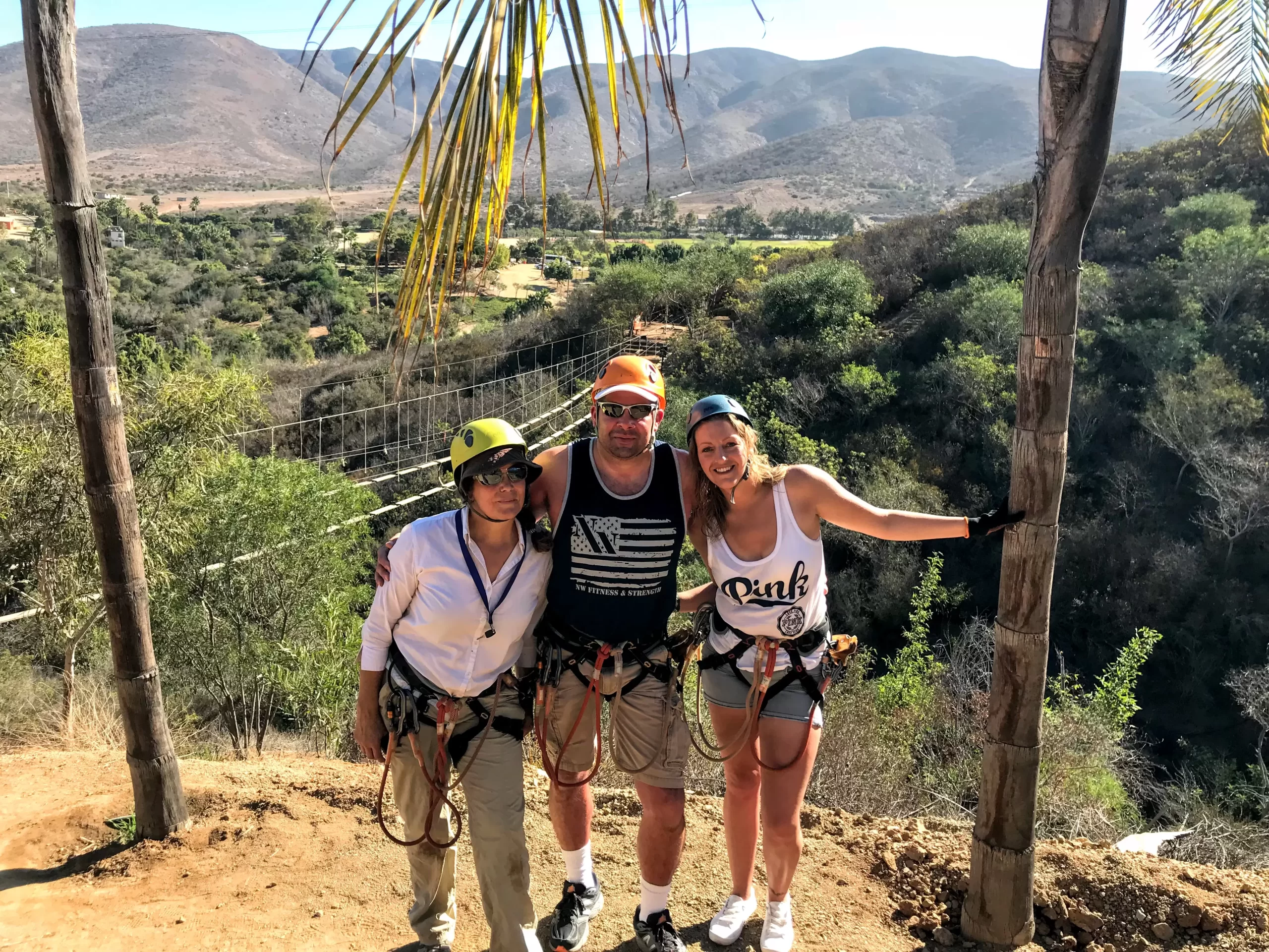 happy people with climbing gear