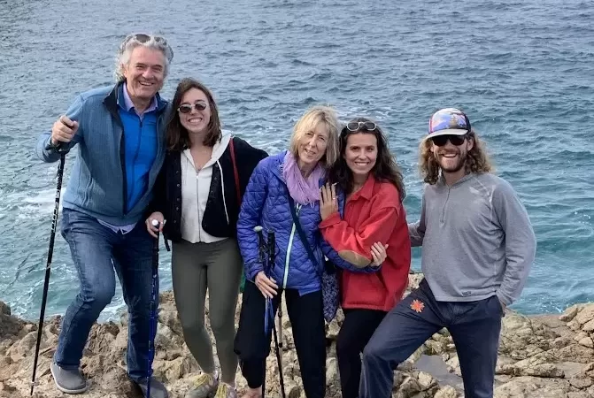 a happy family at the coast