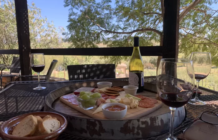 a table with a bottle of wine