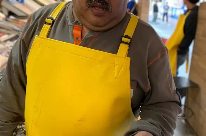 a fisherman at the market