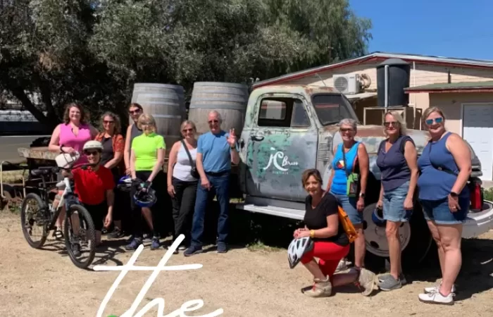 a group with an old truck