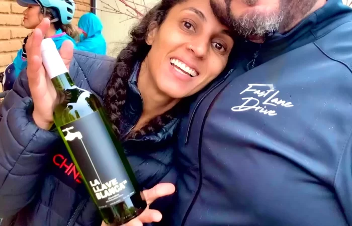 a happy couple with a bottle