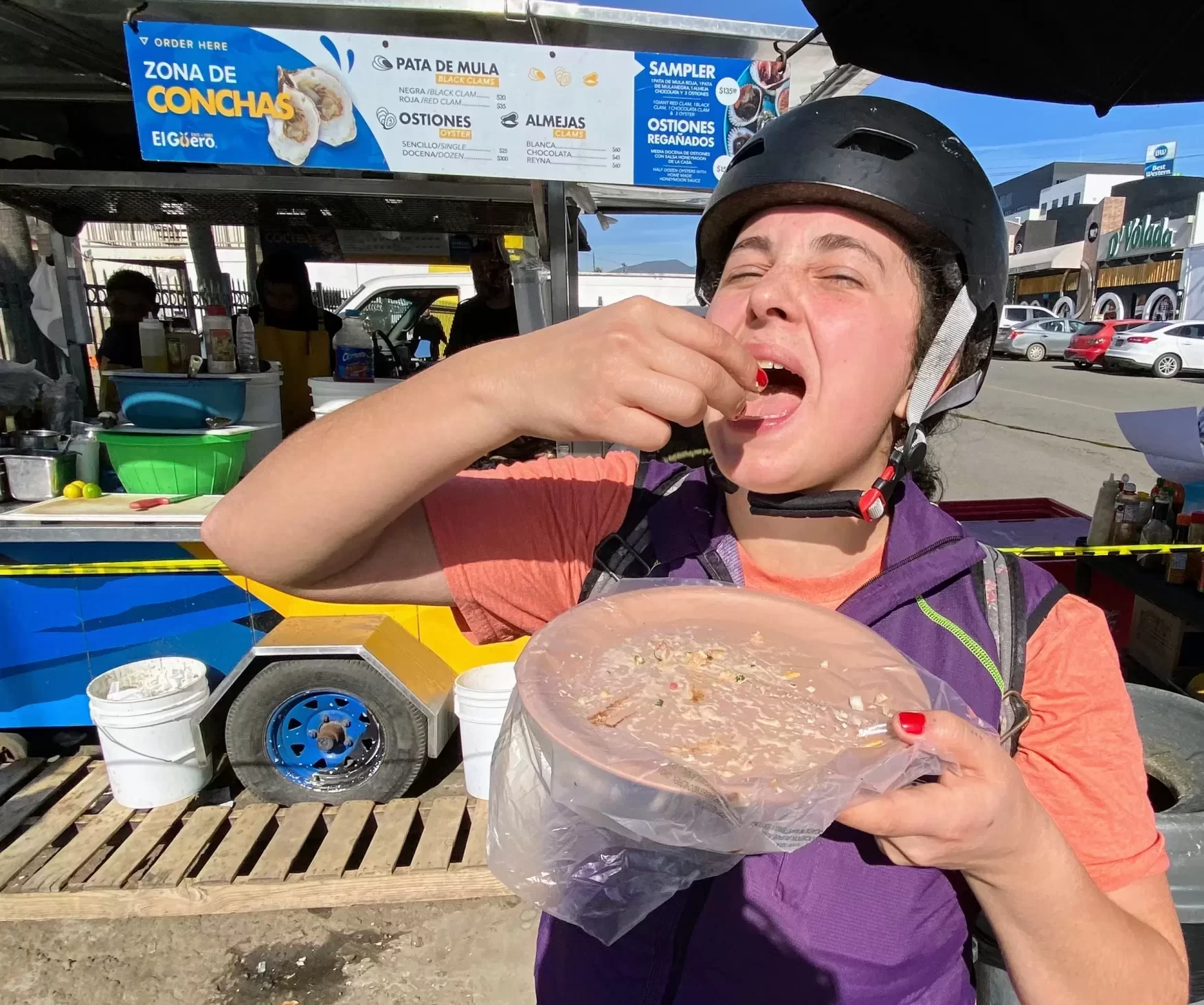 a lady eating standing up