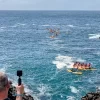 kayaks and photographer